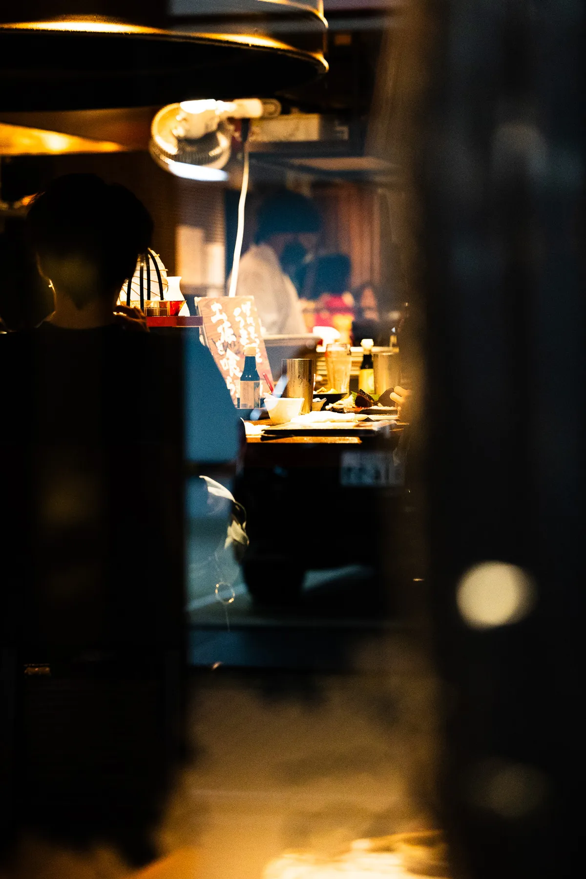 Dimly lit bar interior with ambient glow